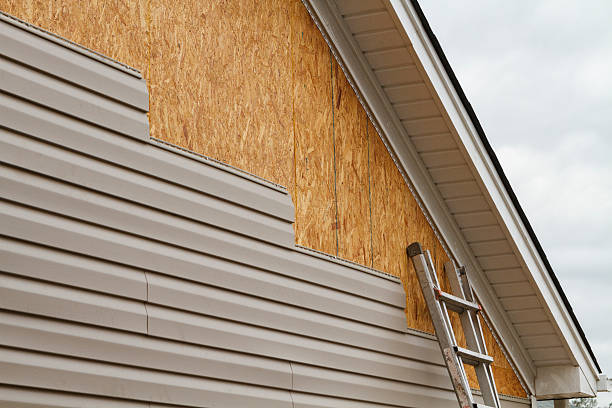 Professional Siding Replacement technician working in Waxhaw, NC